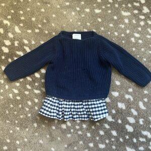 Sweater with plaid ruffle hem